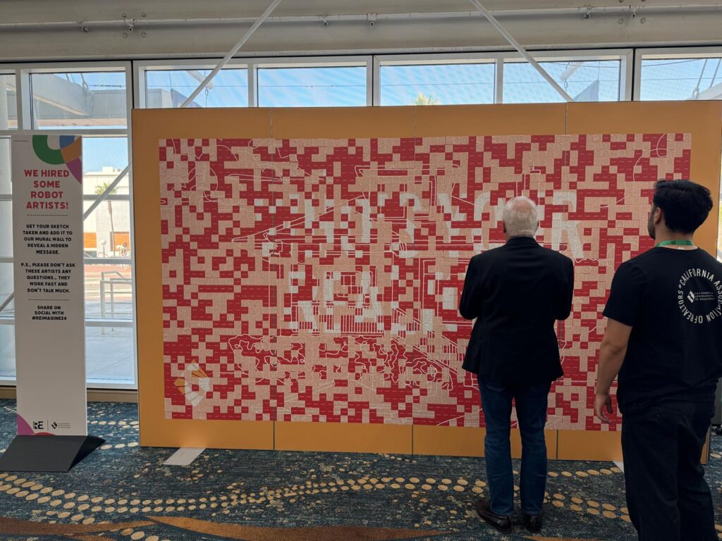 photo in event hall of mosaic installation of photo booth pictures