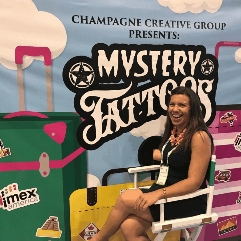 woman at brand activation getting a mystery tattoo relating to creating memorable events