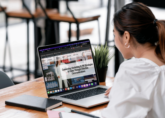 woman looking at laptop screen relating to using ai in marketing