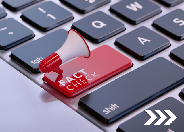 red fact check button on keyboard with tiny megaphone coming out of it relating to meta fact check update