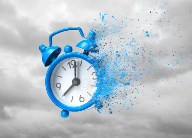blue alarm clock disintegrating relating to time saving marketing tasks