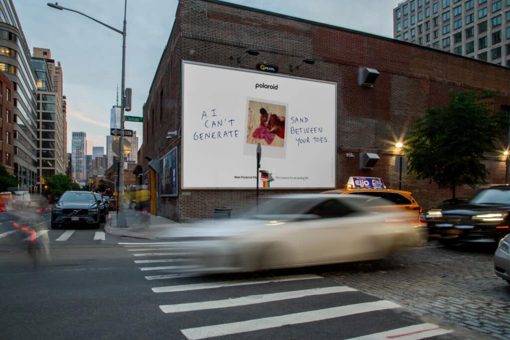 photo of billboard on busy street corner